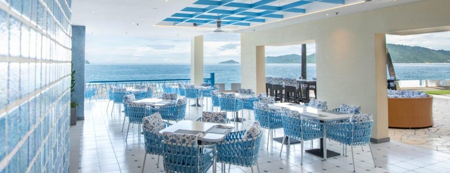 Dining room at Al Fresco, The Magellan Sutera Resort, looking out over the sea